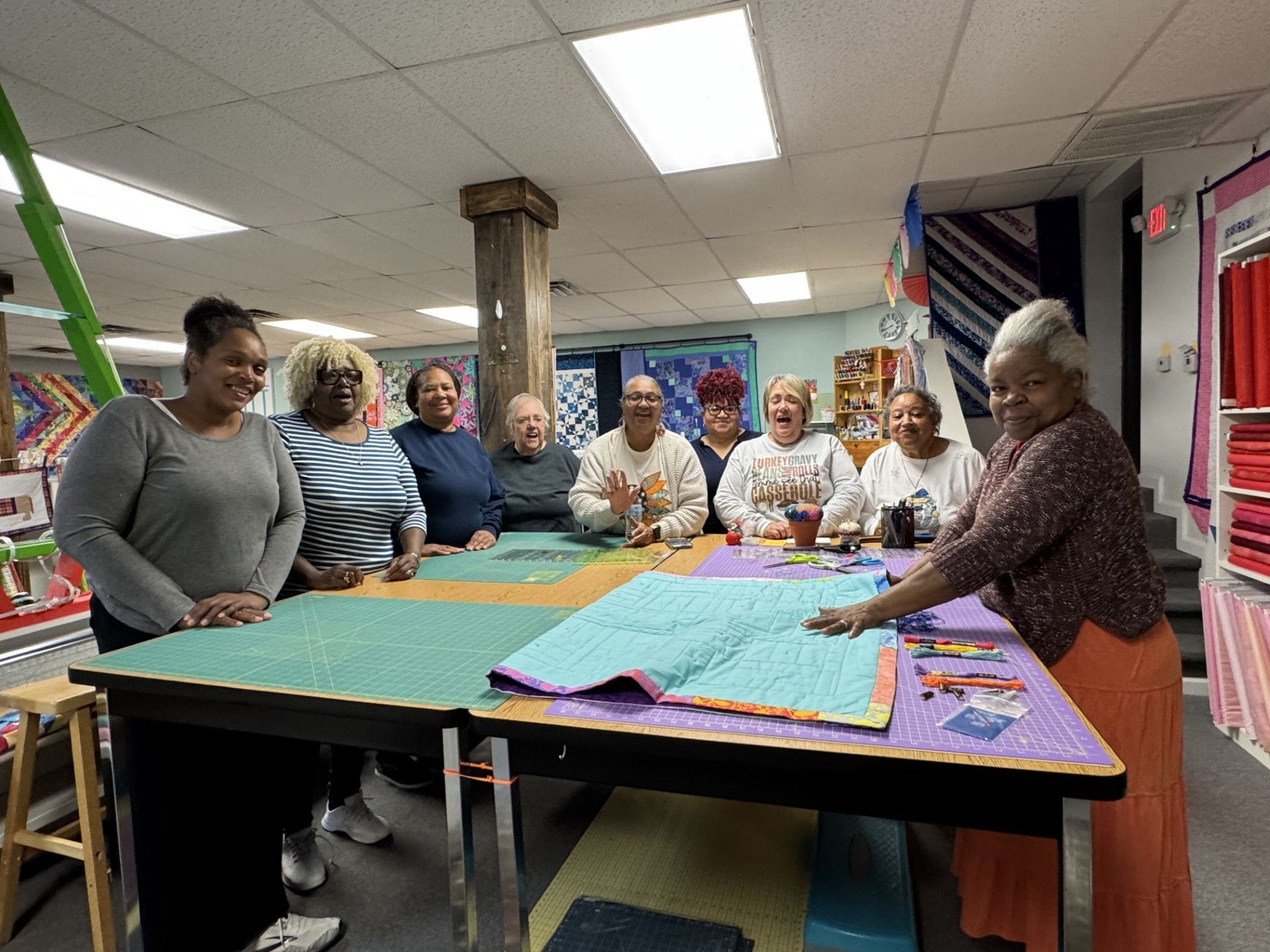 Bluegrass Care Navigators volunteers making quilts for patients