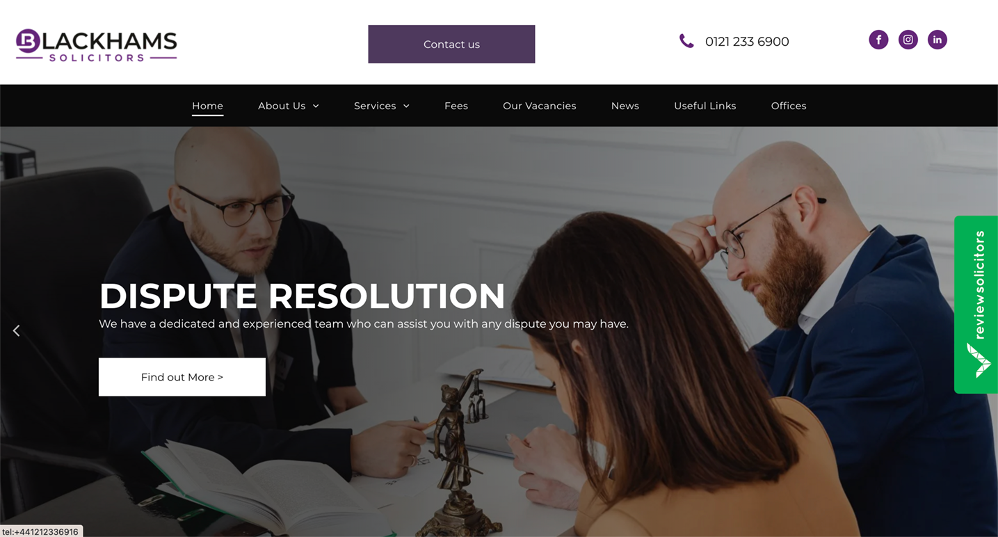 Blackhams Solutions website: Lawyers at a table, discussing dispute resolution.