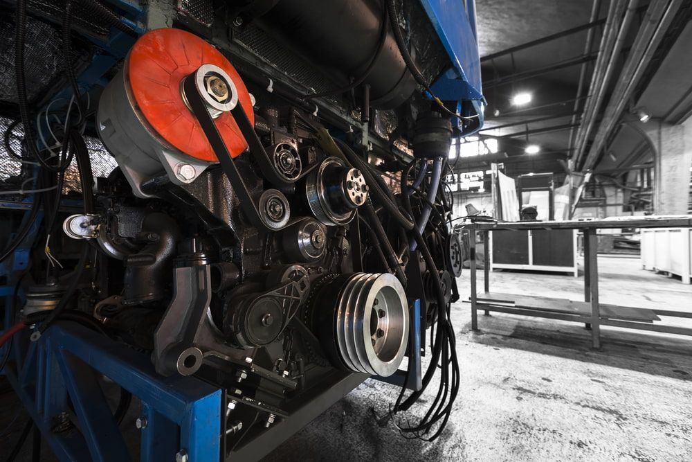 A Close up Of a Tractor Engine in A Factory — Coast Mechanical Services In Berkeley Vale, NSW