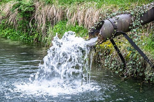 A Pipe Is Pouring Water Into A River - Oklahoma City, OK - Total Pump & Supply A Pipe Is Pouring Water Into A River - Oklahoma City, OK - Total Pump & Supply