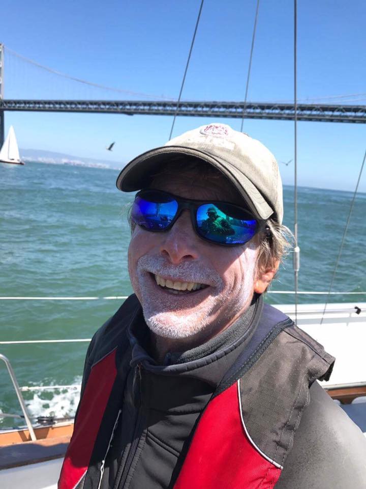Captain Mark sailing under the Golden Gate Bridge