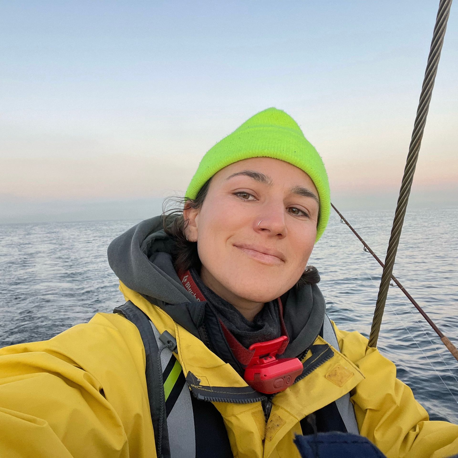Captain Ruby sailing at sunset for a private ash scattering ceremony