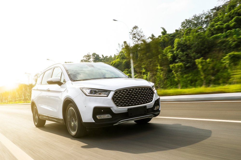 Car on the Road Driving — DEM Automotive in Edmonton, QLD