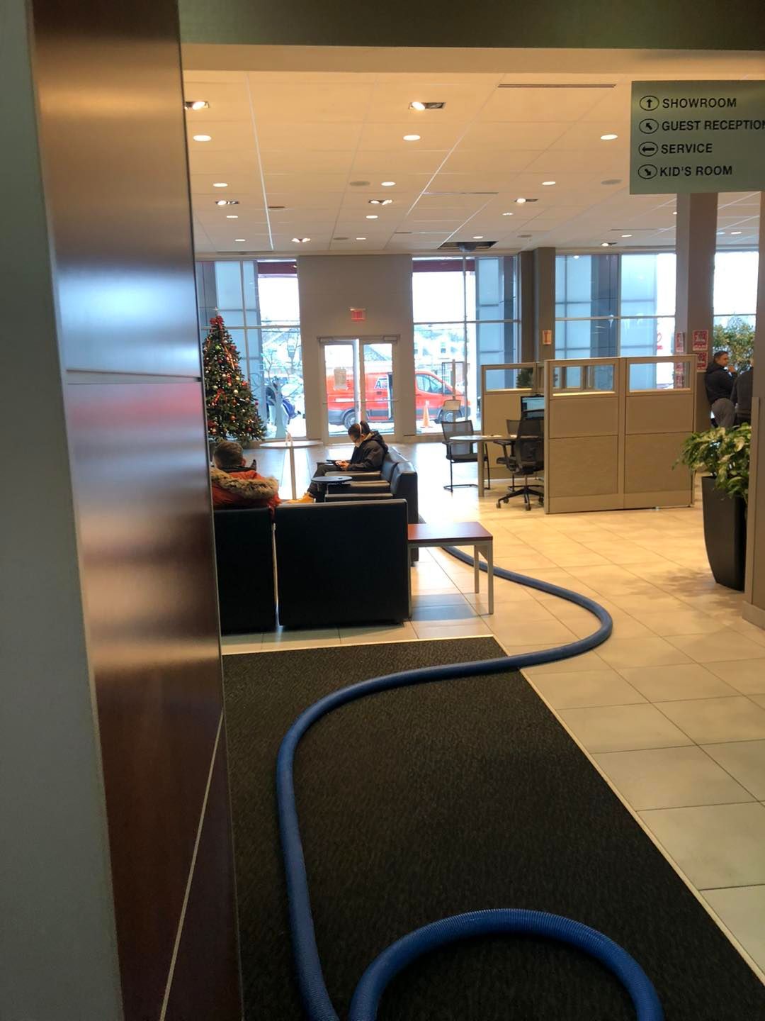 Blue hose lying in the middle of a room in a Cleveland home.
