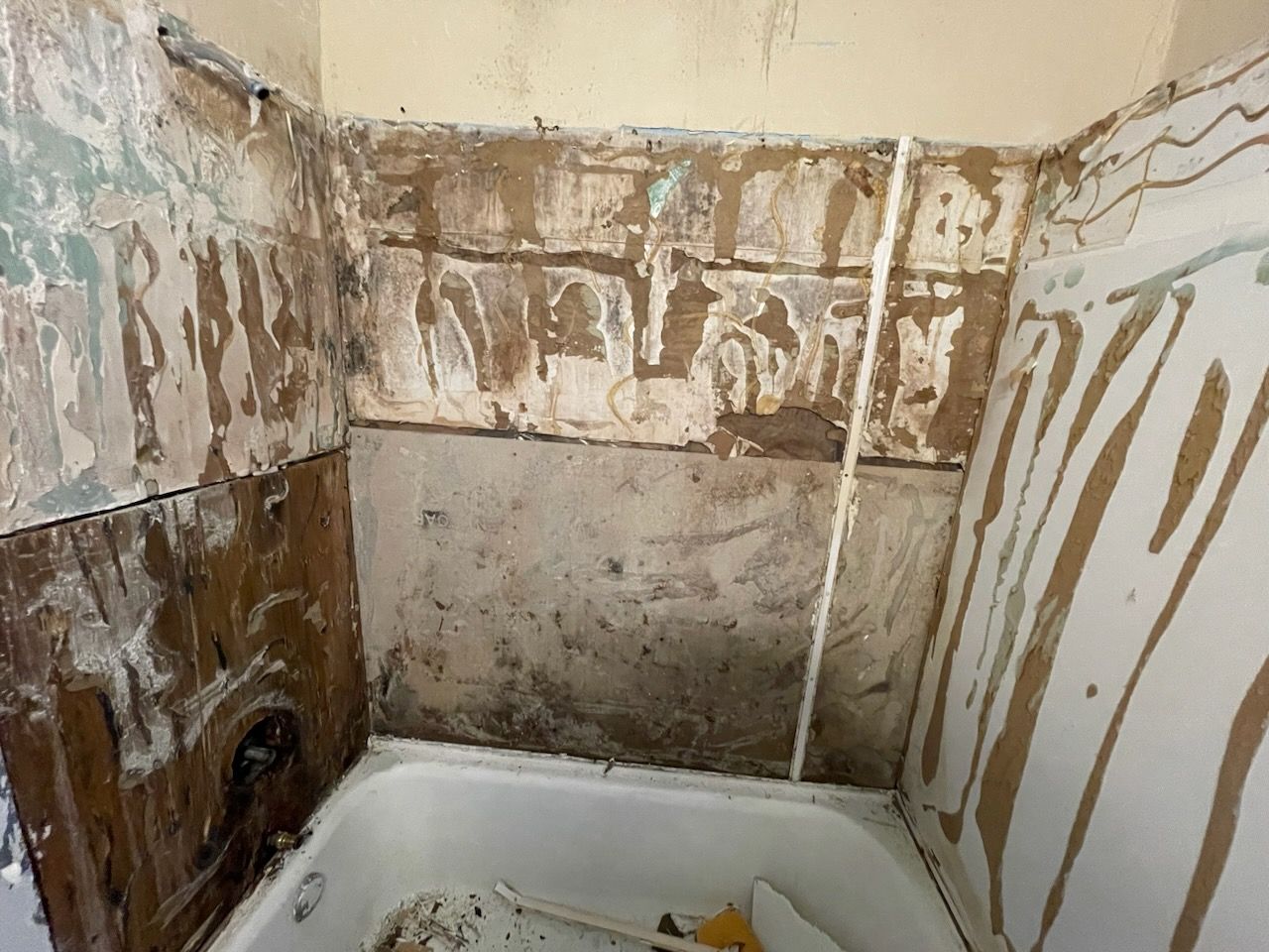 Bathroom remodeling project near me in Cleveland, OH with bathtub, sink, and toilet