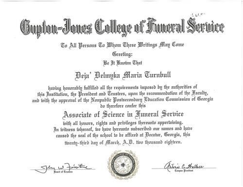 Diploma certificate with ornate black text and a gold seal on a white background