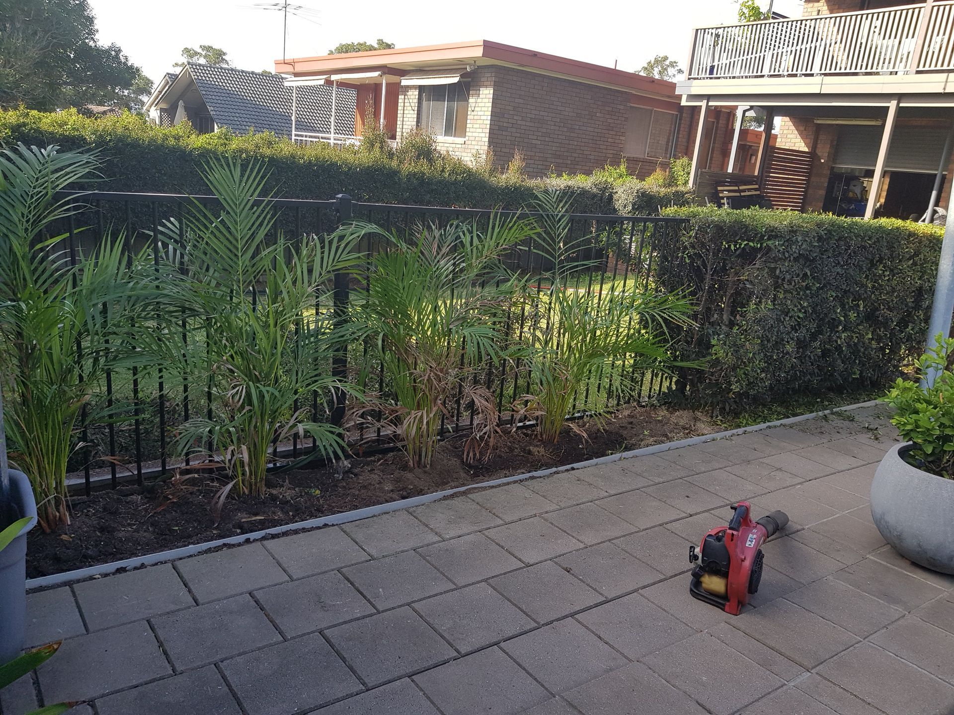 A garden bed with a blower on the side — The Local Bloke Lawn & Garden Care In Warners Bay, NSW