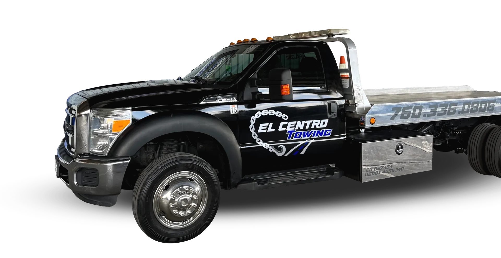 A black tow truck is parked on a white background.