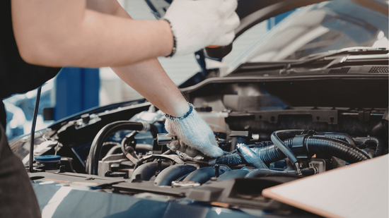 a mechanic doing an automobile repair