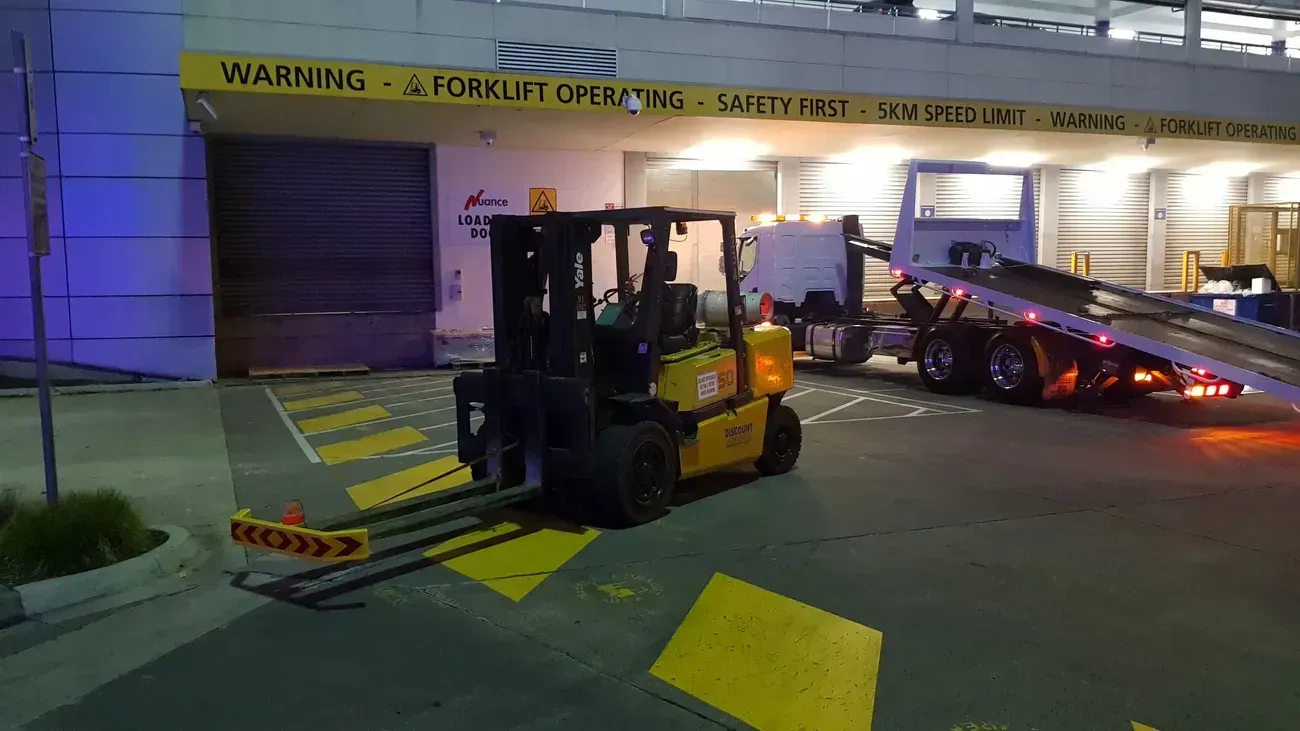 Yellow forklift at night | Derrimut, VIC | Discount Forklifts