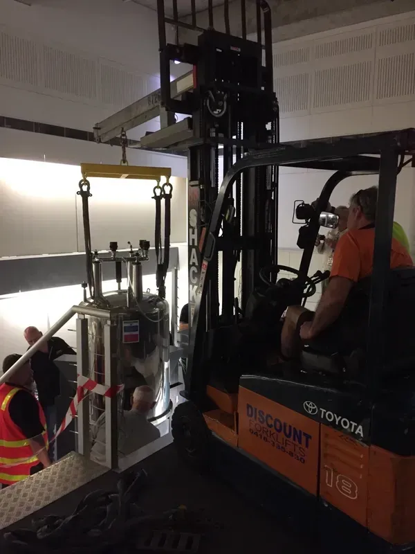 Forklift lifting a tank | Derrimut, VIC | Discount Forklifts