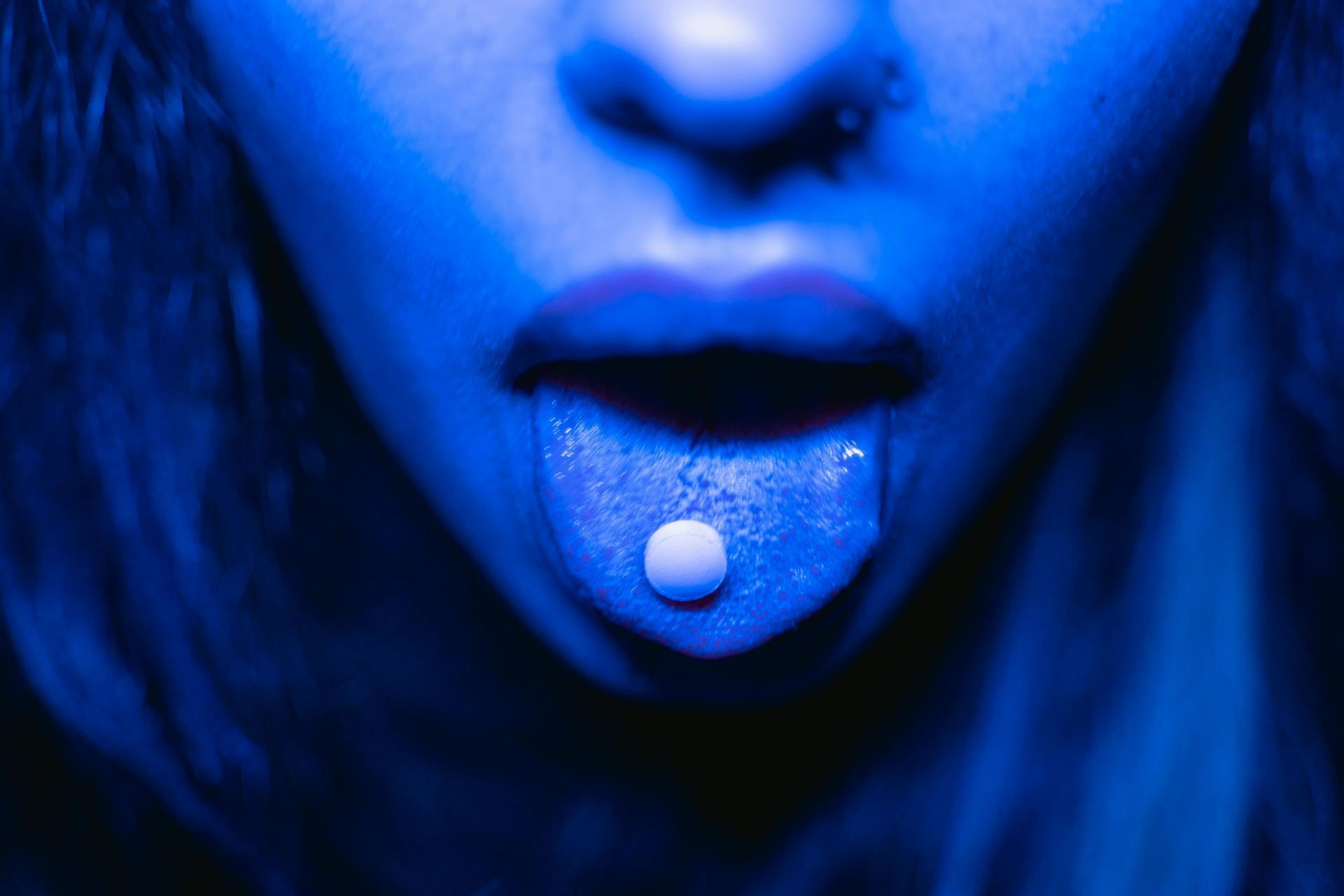 Woman taking a pill