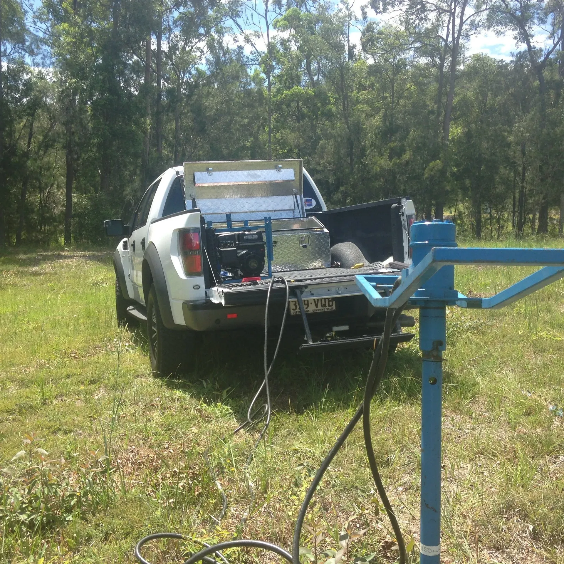 A Pick-Up Truck Carrying a Machine for Soil Testing | Qld | Country-Wide Water Pty Ltd