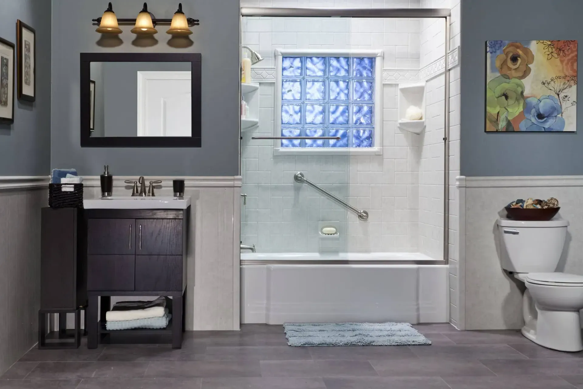 Bright white bathroom with marble tile shower