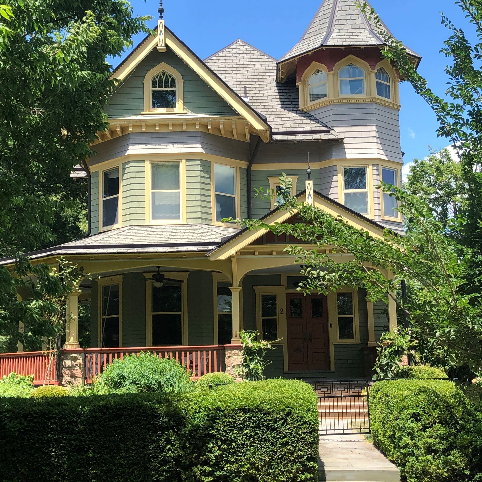 A large house with a tower on top of it