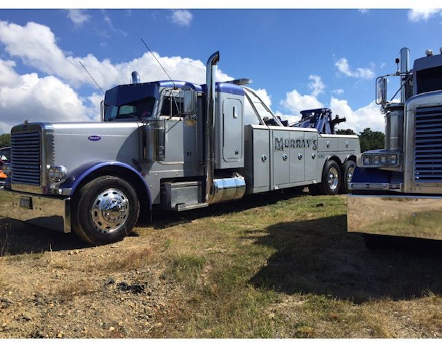 tow truck in grass