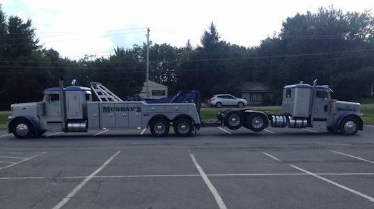 Tow truck towing a truck