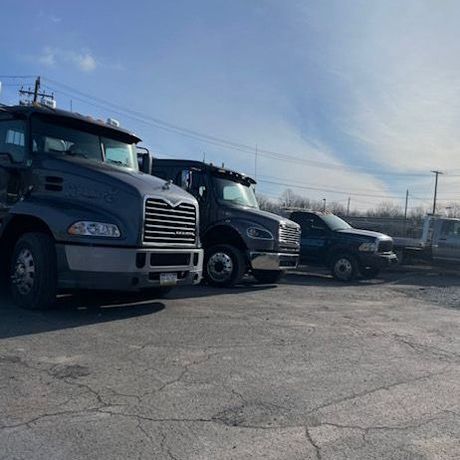 Tow Trucks in a lot