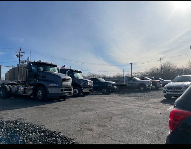 Tow Trucks lined up in parking lot