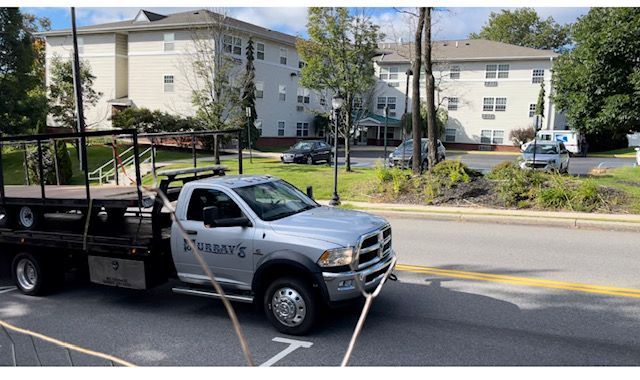Tow Truck driving in town