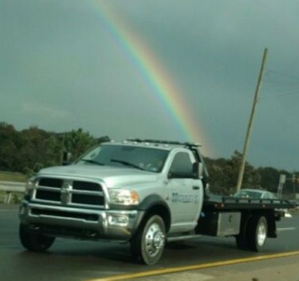 Murray's tow truck with rainbow