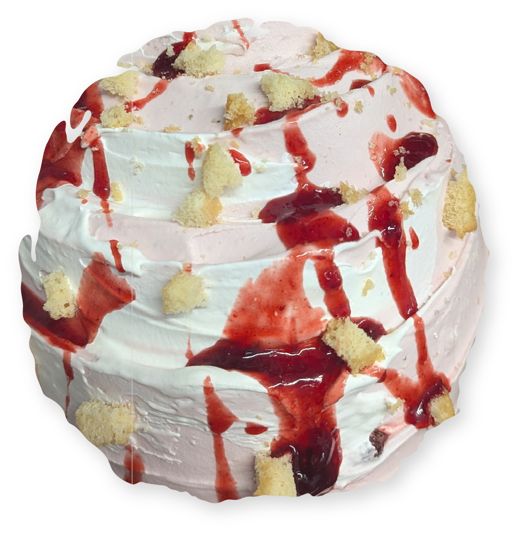 A scoop of strawberry cheesecake ice cream topped with red strawberry syrup and chunks of golden graham cracker crust.