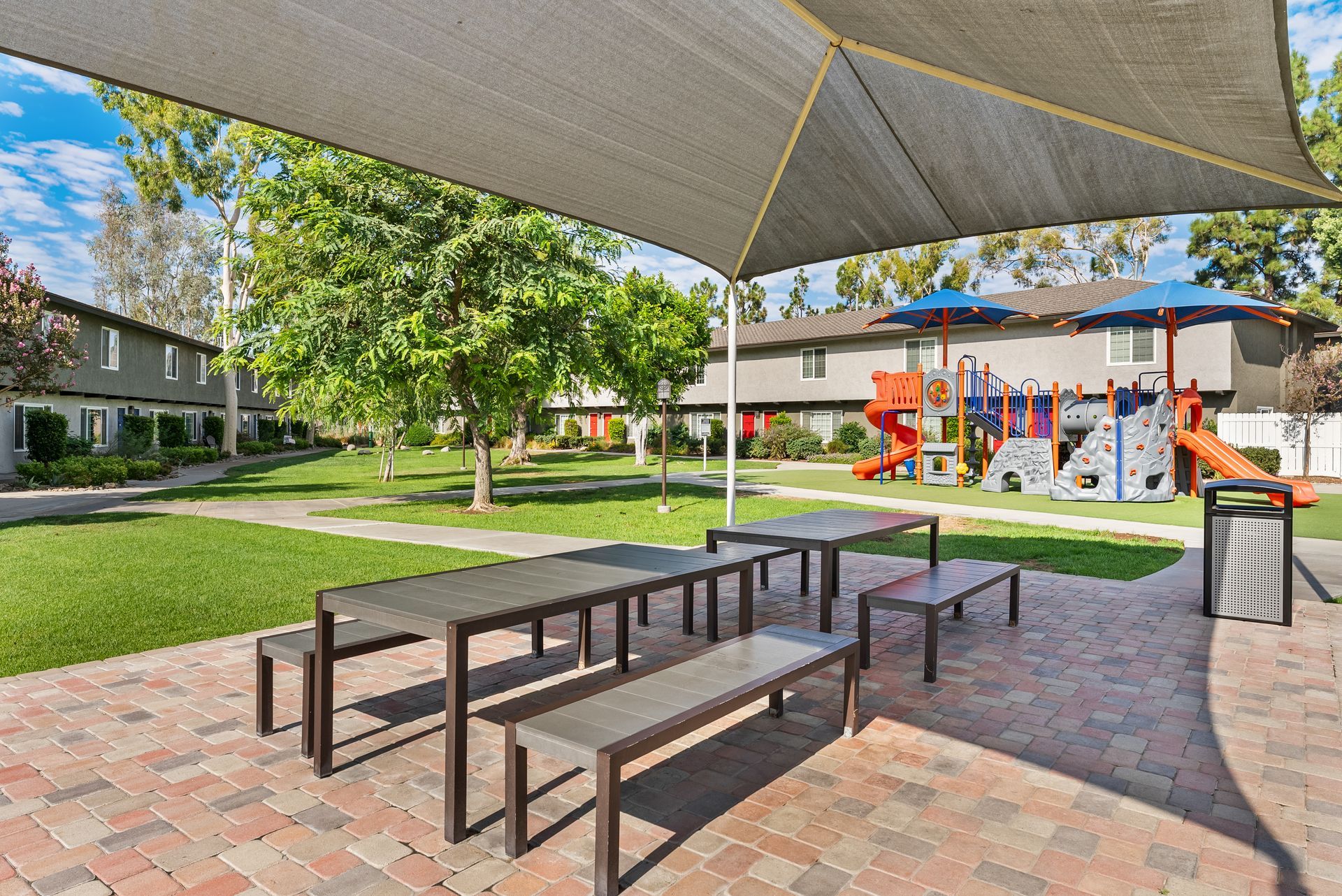 covered picnic tables and playground