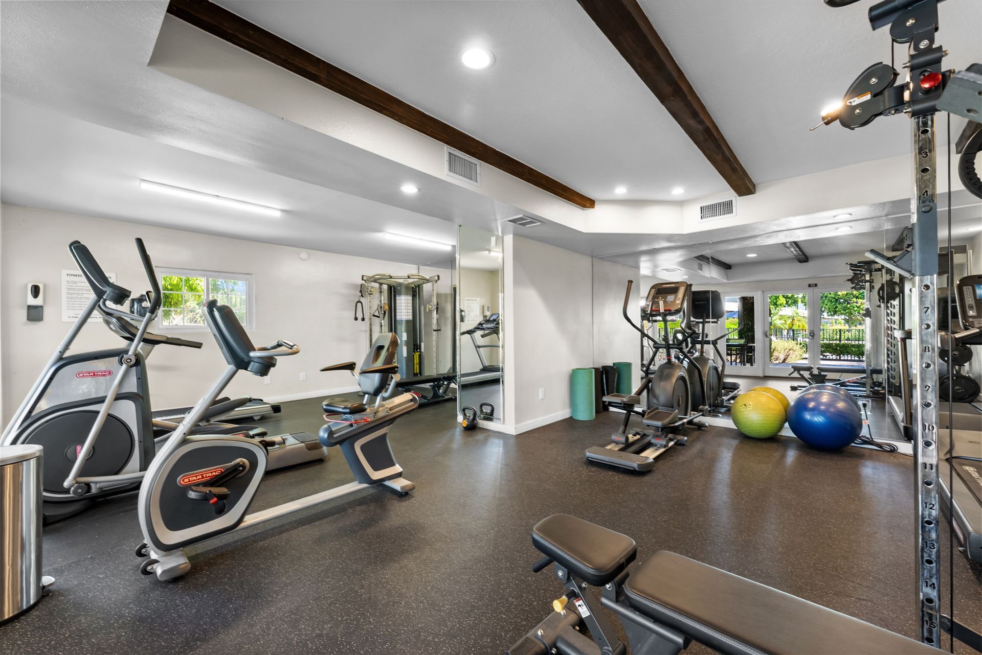 fitness center with cardio equipment