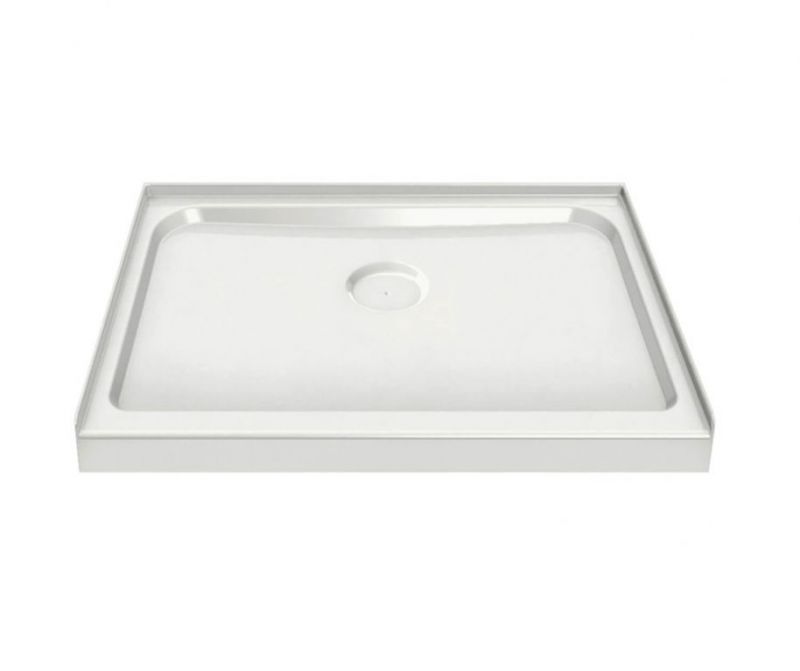 A white shower tray with a hole in the middle on a white background.