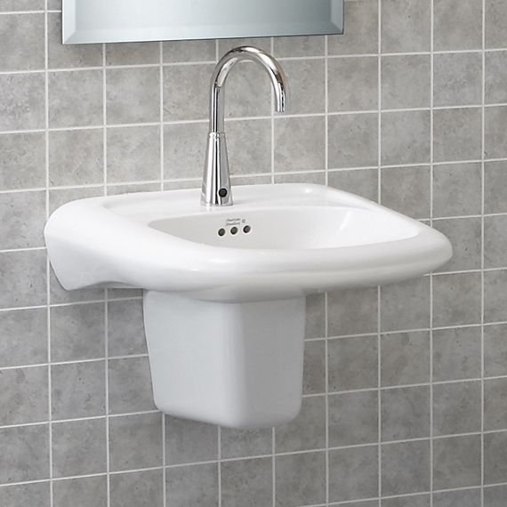 A bathroom sink with a faucet and a mirror