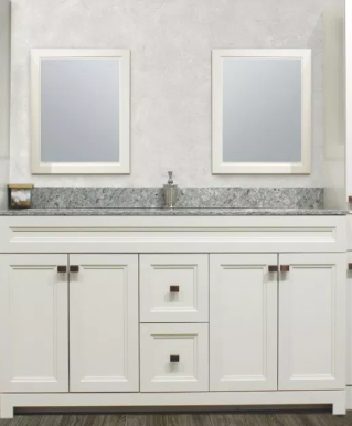 A bathroom vanity with two mirrors and a sink
