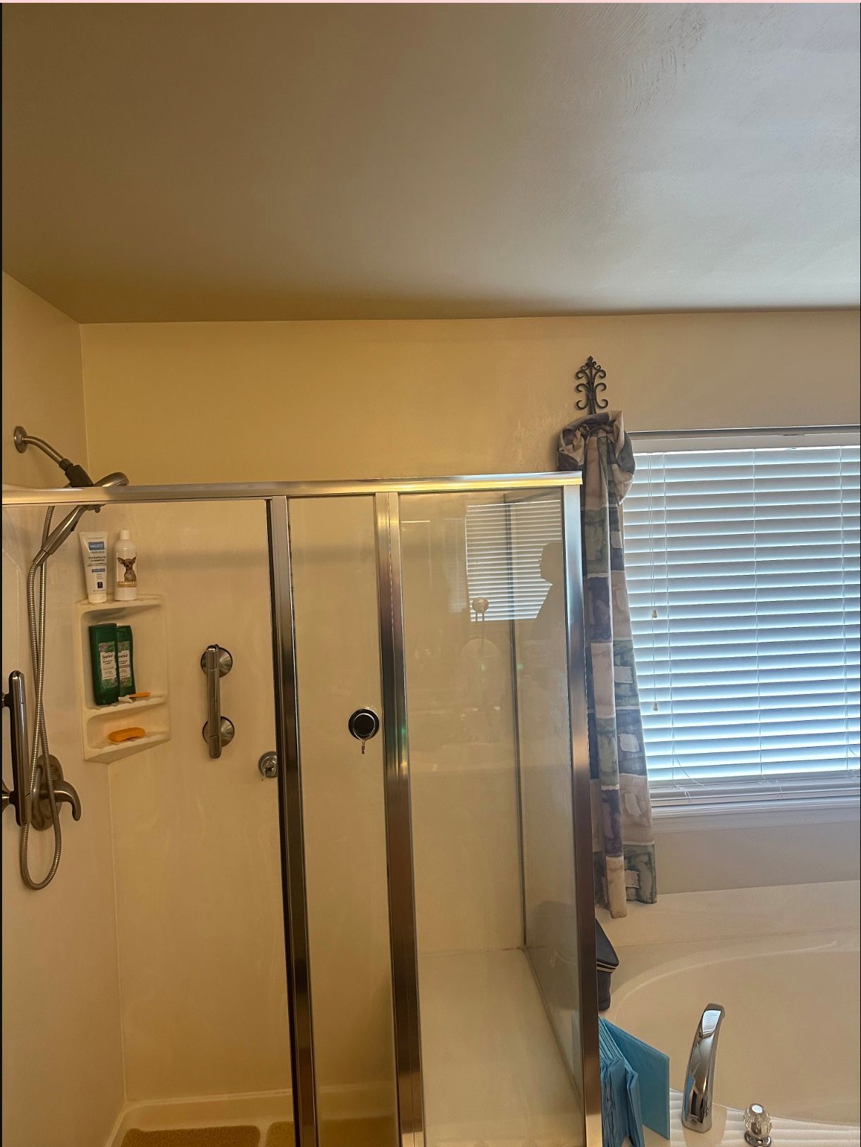 A bathtub is sitting in a bathroom under construction.