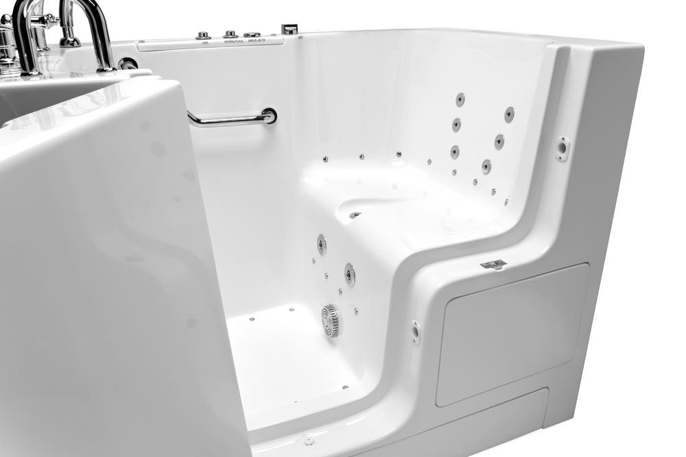 A white walk in tub with a seat and a door.