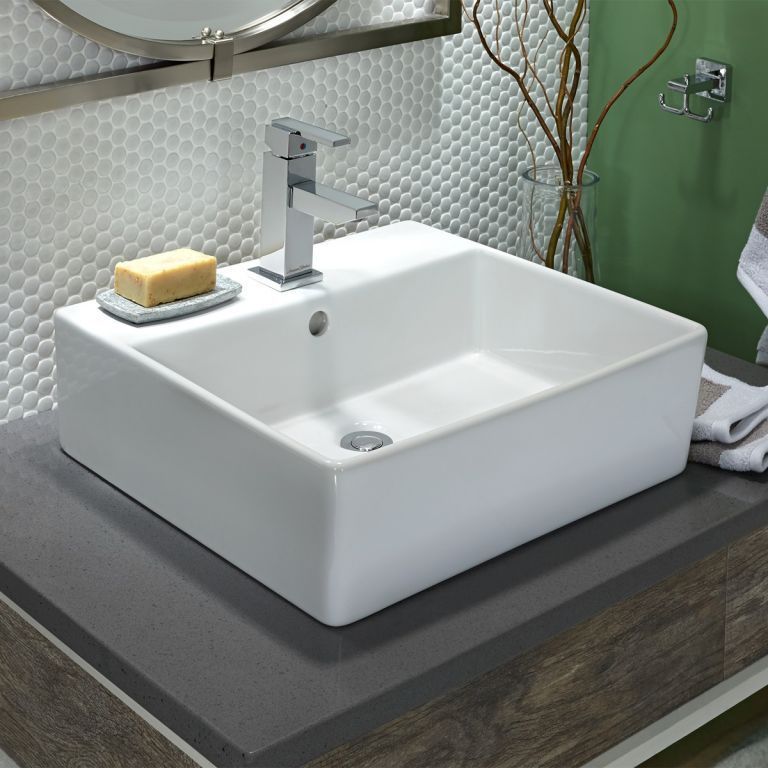 A bathroom sink with a soap bar on top of it