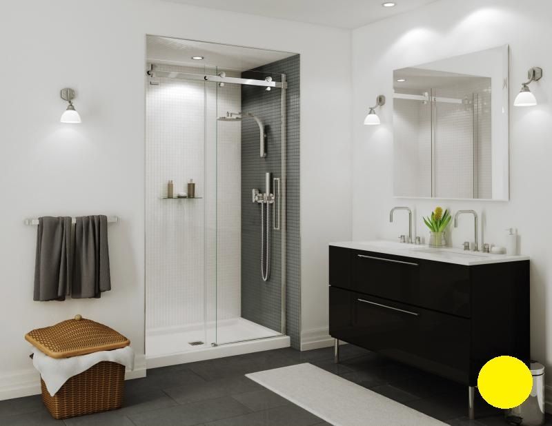 A bathroom with a sliding glass shower door