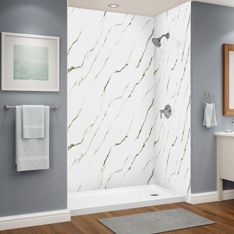 A bathroom with a walk in shower and a sink
