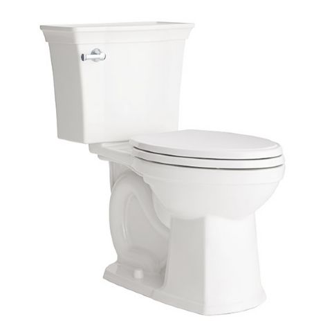 A white toilet with a white seat on a white background.