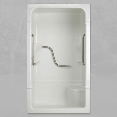 A white bathtub with stainless steel handles on the side.