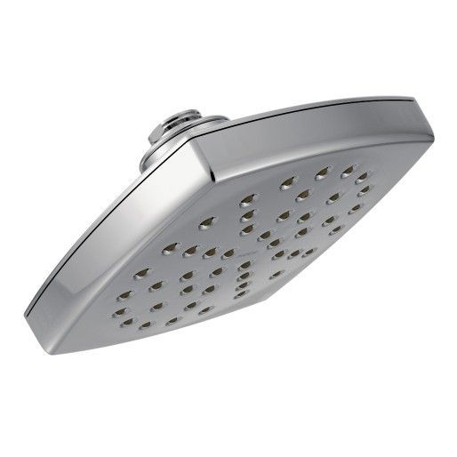 A close up of a shower head on a white background