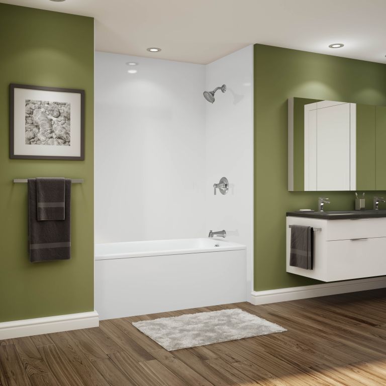 A bathroom with green walls and a bathtub