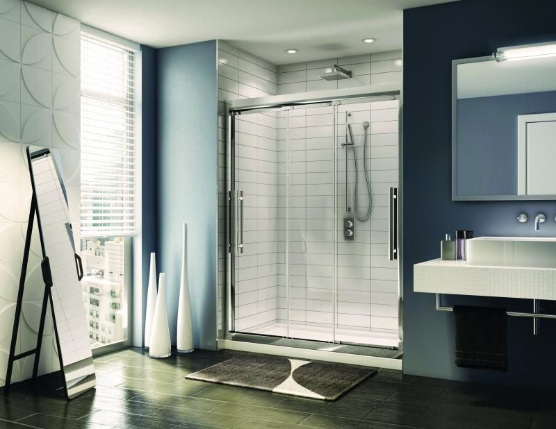 A bathroom with a sliding glass shower door and a sink.