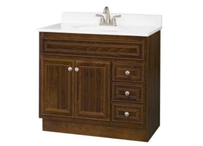 A bathroom vanity with a sink and faucet