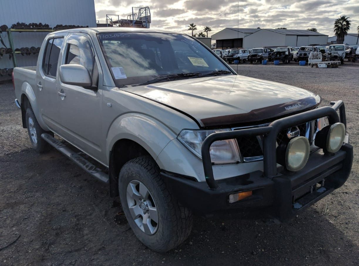 A Silver Truck With A Black Bumper Is Parked In A Parking Lot — Scott's 4WD Parts Plus In Coonabarabran, NSW
