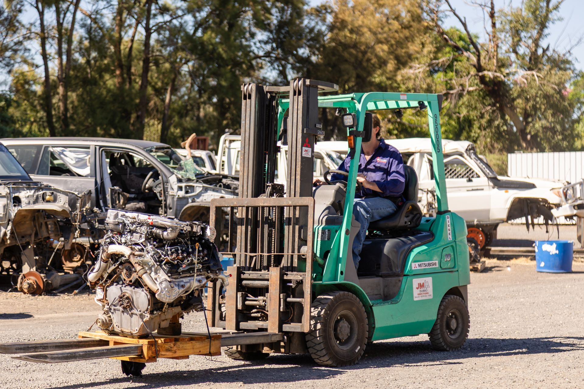 A forklift with an engine on the front— Scott's 4WD Parts Plus In Dubbo, NSW