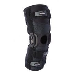 A black knee brace on a white background.