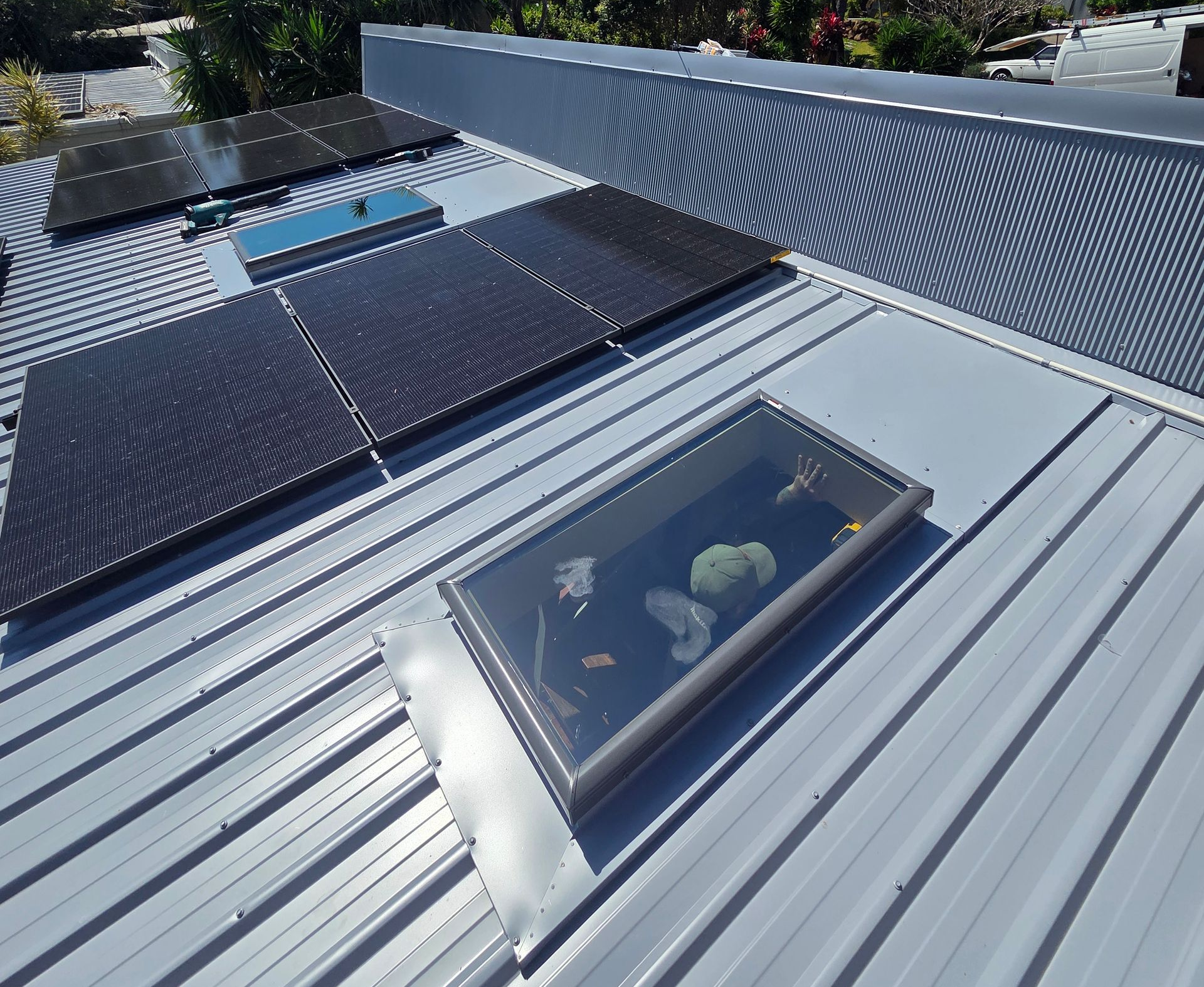 Roof With Solar Panels and Skylights Under a Clear Blue Sky — Beyond Skylights in Byron Bay, NSW