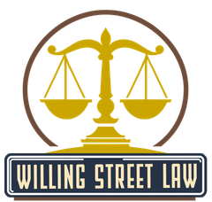 A logo for willing street law with scales of justice