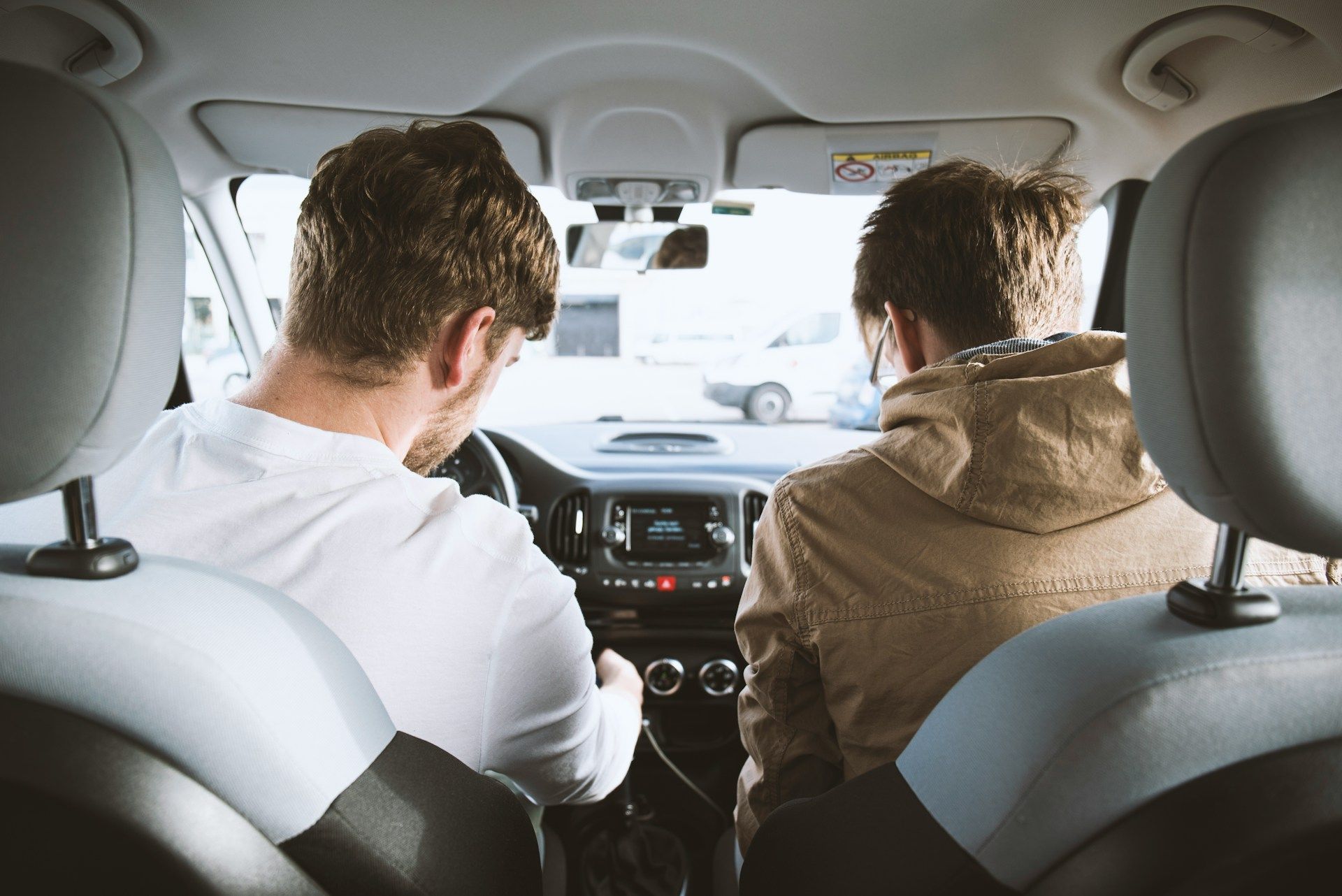 Car Insurance for Everyday Drivers - View inside car of driver and passenger