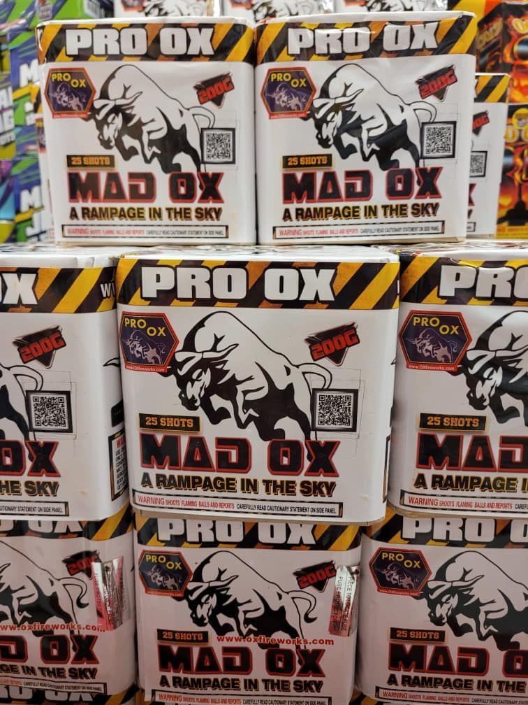 Several boxes of mad ox fireworks are stacked on top of each other