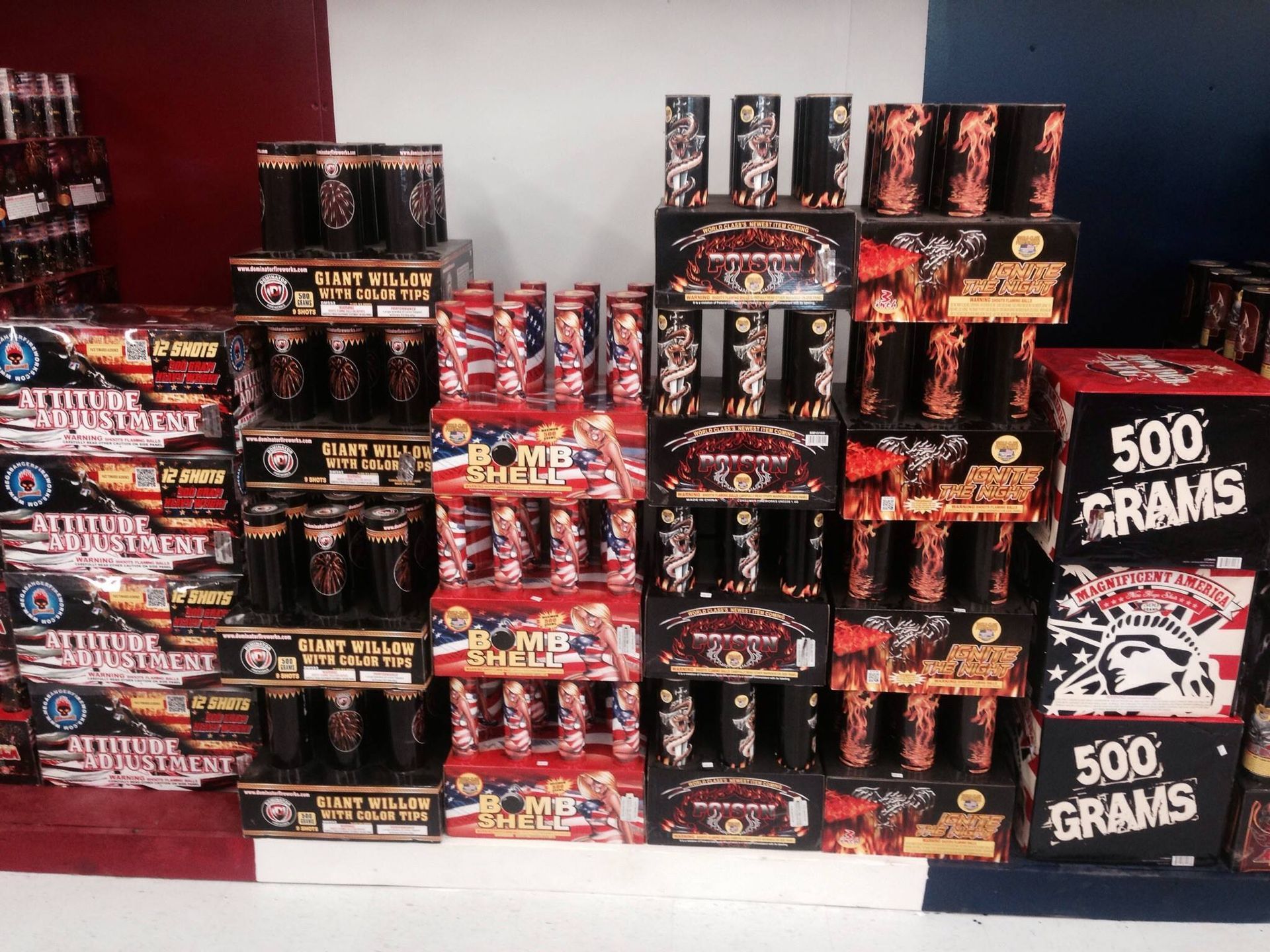 Boxes of fireworks are stacked on top of each other and one says 500 grams